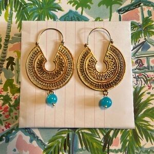 Gold look statement earrings from Thailand, White Lotus Style